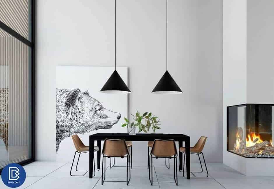 Thiết kế nội thất văn phòng phong cách tối giản 10 Mẫu thiết kế với gam màu trắng - đen - nâu cùng với cây xanh và tranh ảnh làm cho không gian không không bị nhàm chán hay lạnh lẽo