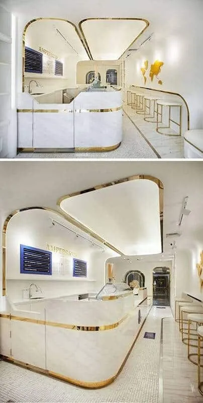 Phong cách hiện đại sang trọng khi decor quầy bar bằng đá viền vàng ánh kim