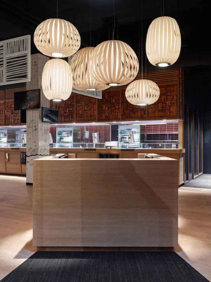 mẫu quầy lễ tân nhà hàng bằng đá hệ thống đèn sáng tạo