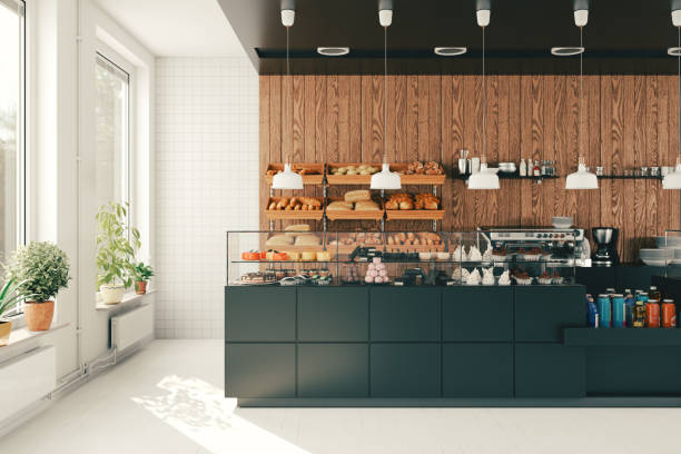 Modern bakery cafe with display of bread, cakes, and pastries. Modern bakery cafe with display of bread, cakes, and pastries.