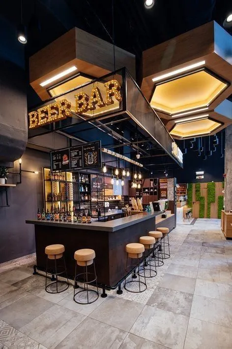 Quầy Bar Sang Trọng Tạo Điểm Nhấn Đẳng Cấp Cho Không Gian 4 Quầy bar sang trọng với ánh sáng bắt mắt, thu hút người nhìn